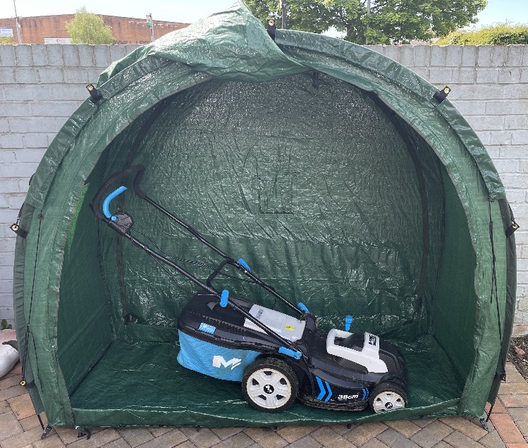 TidyTent garden storage tent with lawnmower.
