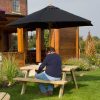 250cm black wooden frame parasol in garden